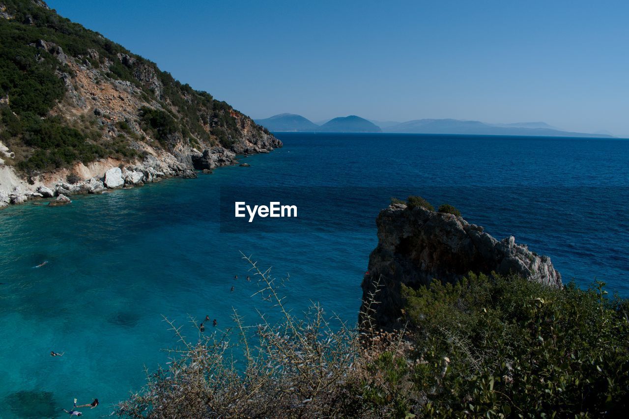 Scenic view of sea against clear sky