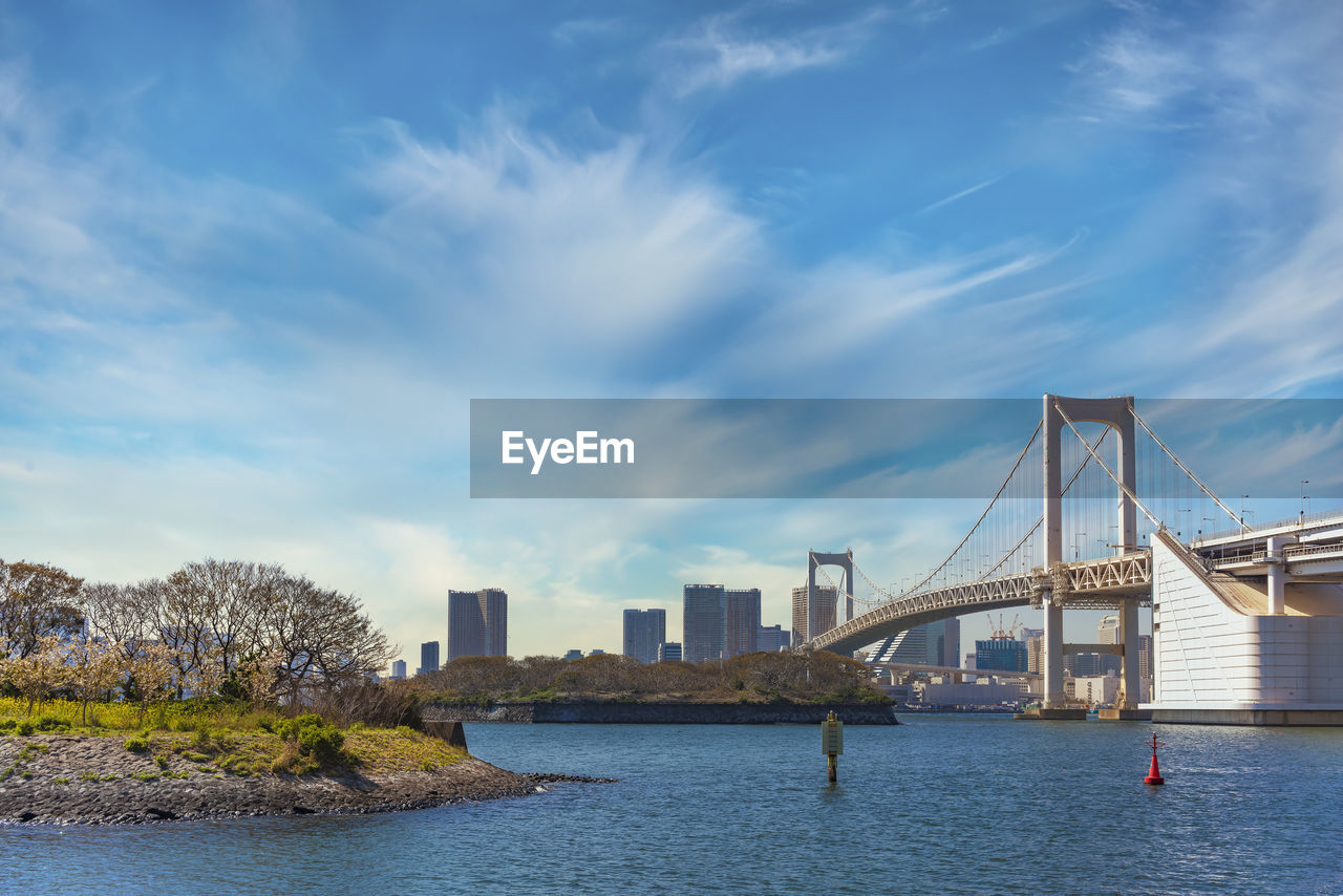 Bird island of odaiba bay in front of the double-layered suspension rainbow bridge.