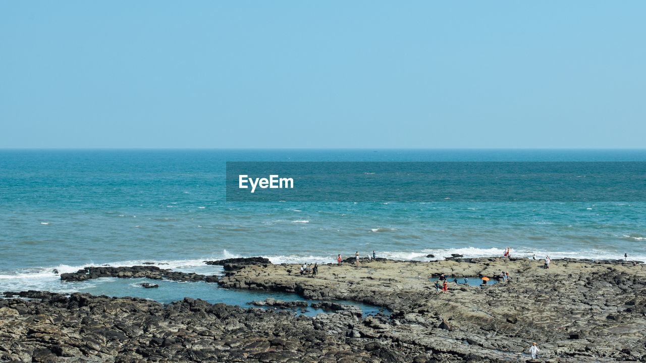 Scenic view of sea against clear sky