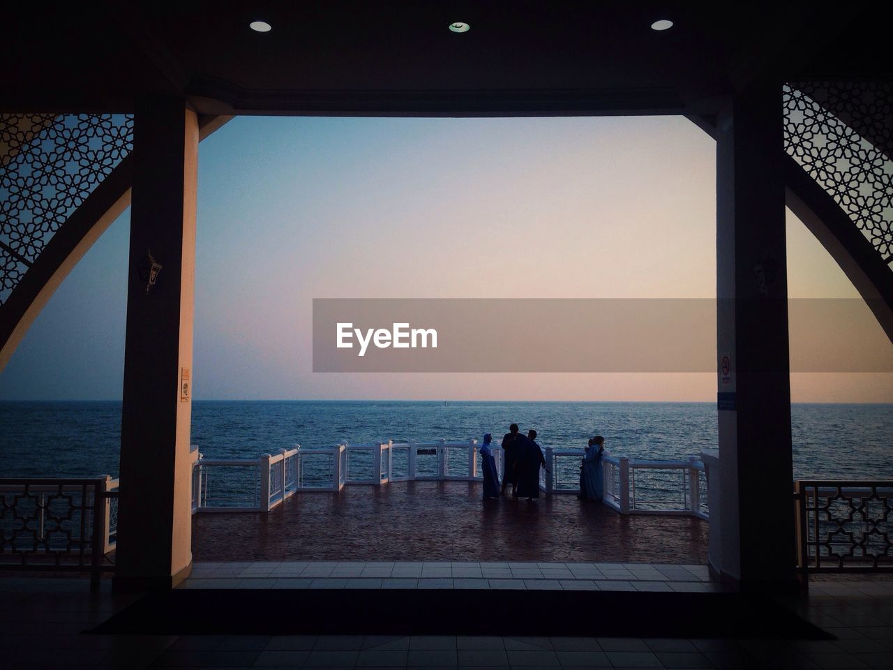 People looking at sea from observation point