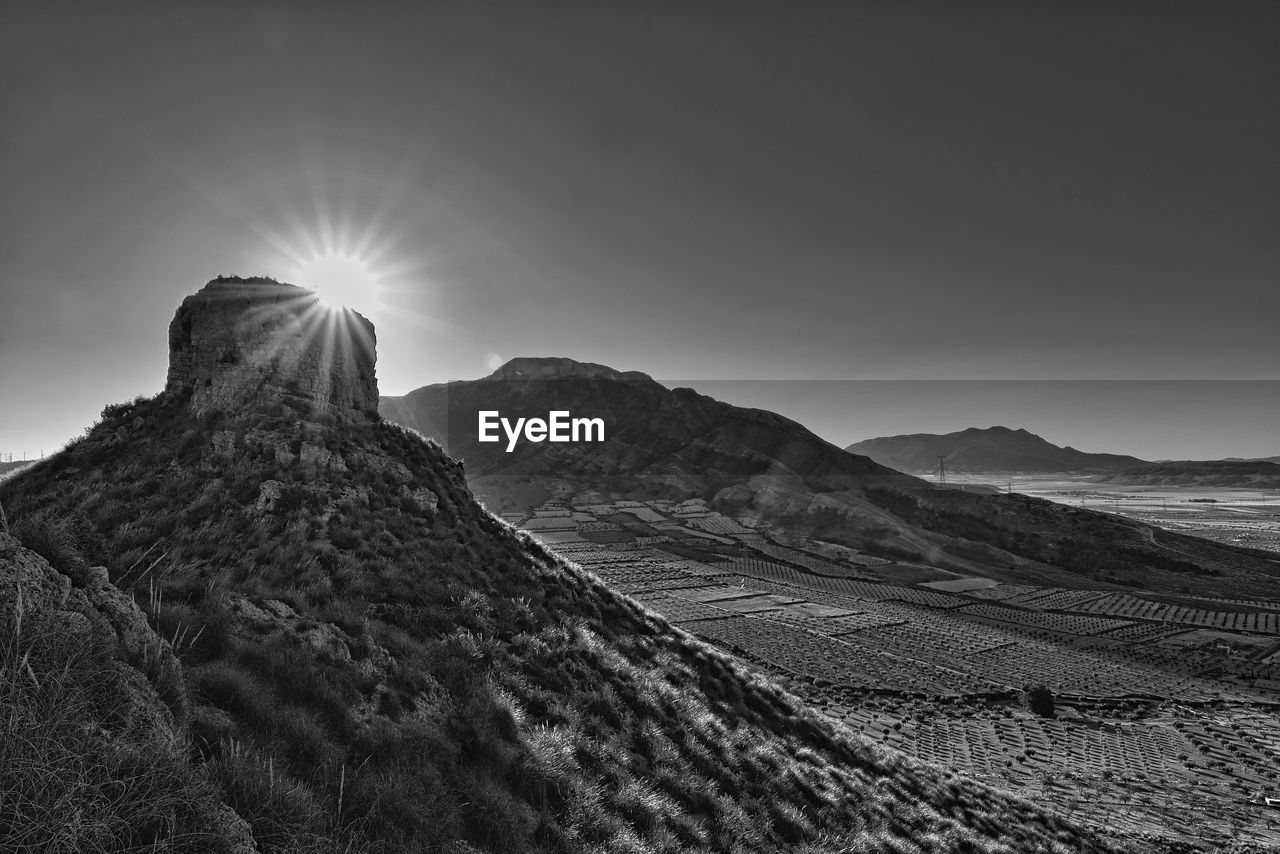 Scenic view of mountains against clear sky