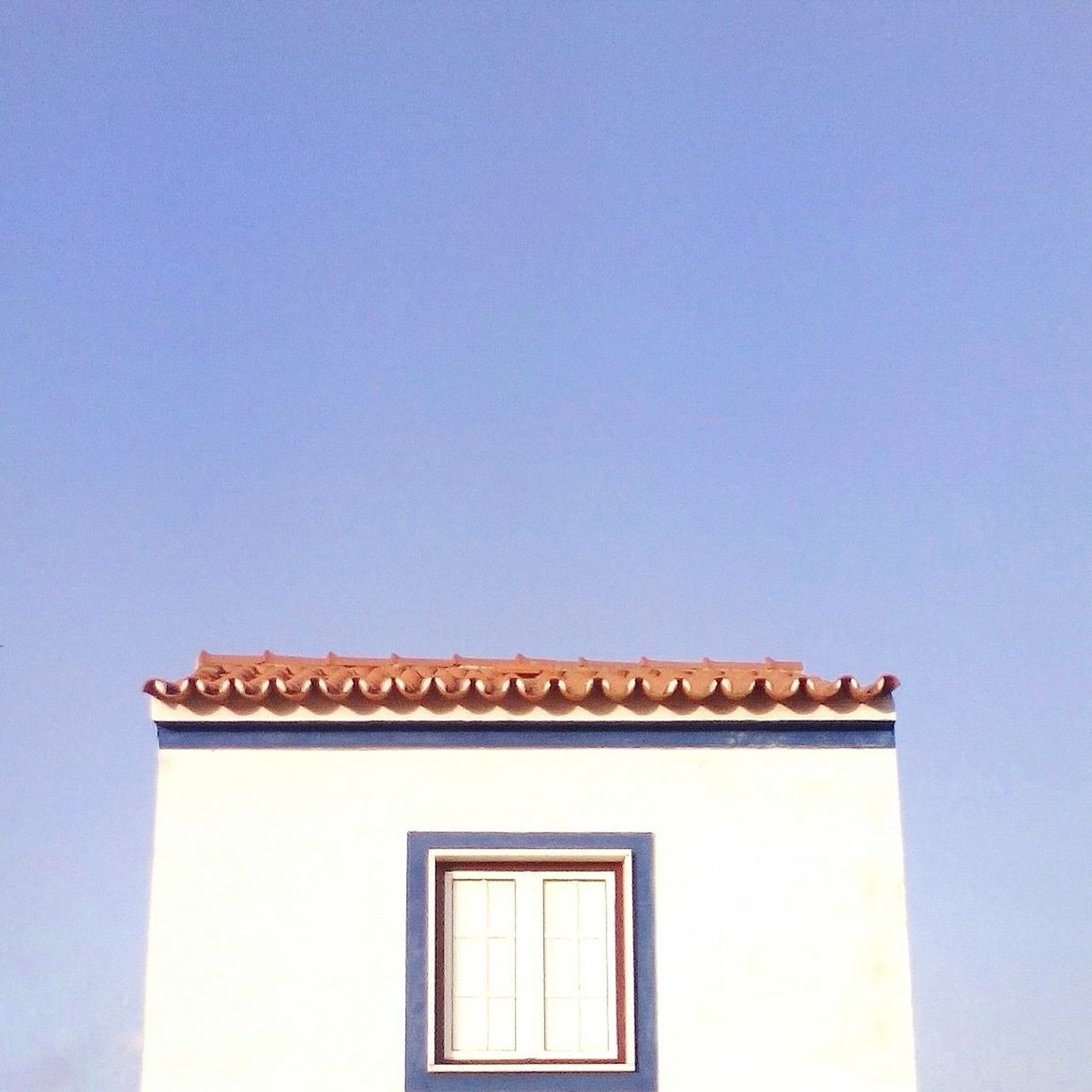 Low angle view of house against clear sky