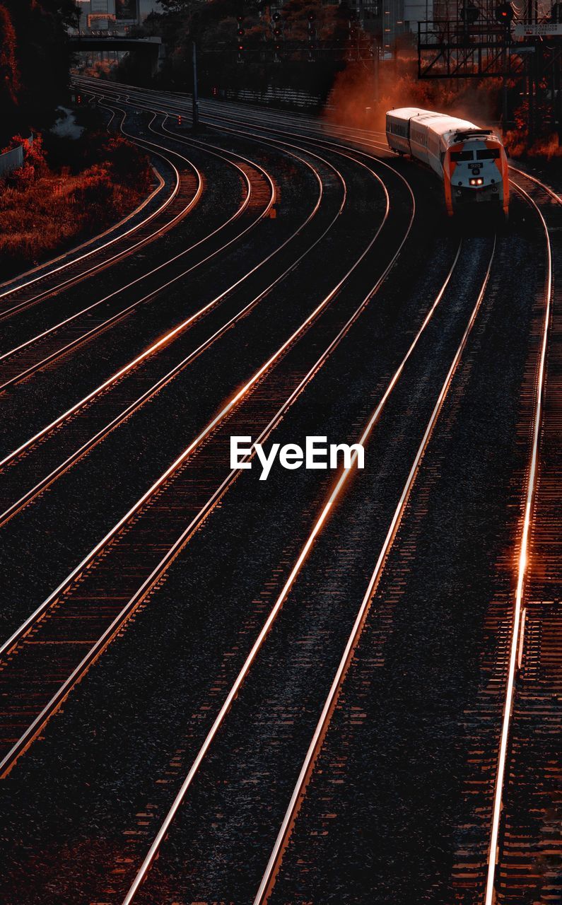 High angle view of railroad tracks at night