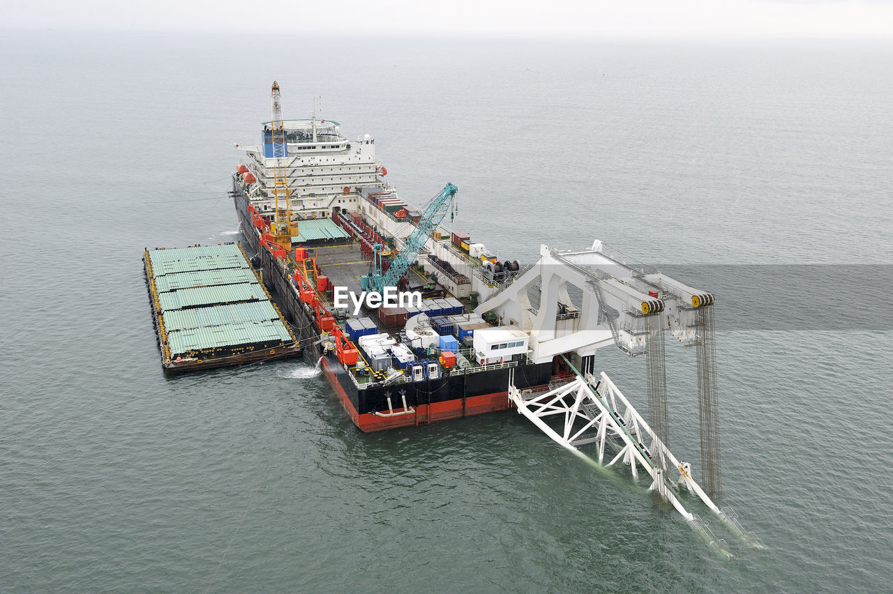 High angle view of cargo container at harbor