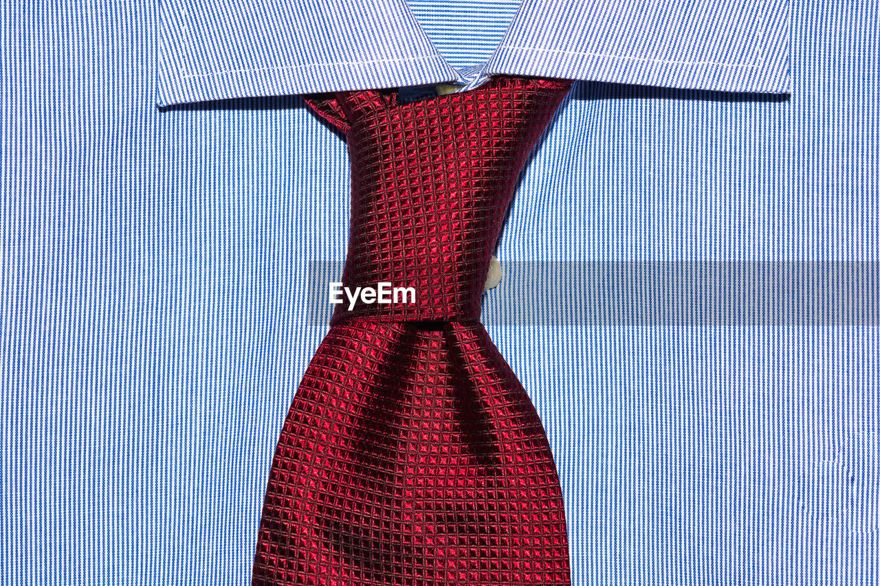 Close-up of necktie on shirt