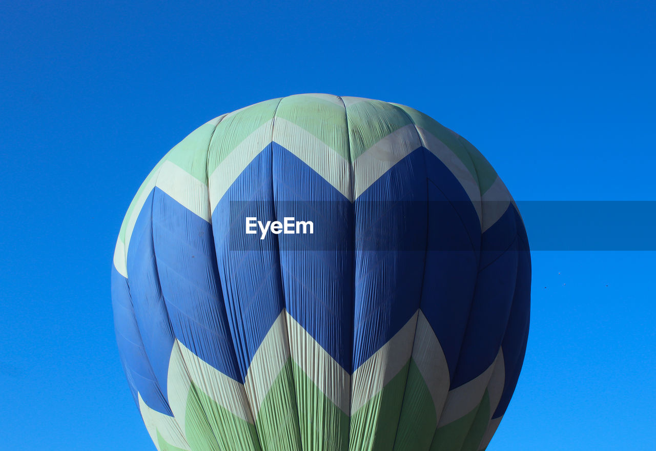 Hot air balloon on the blue background 