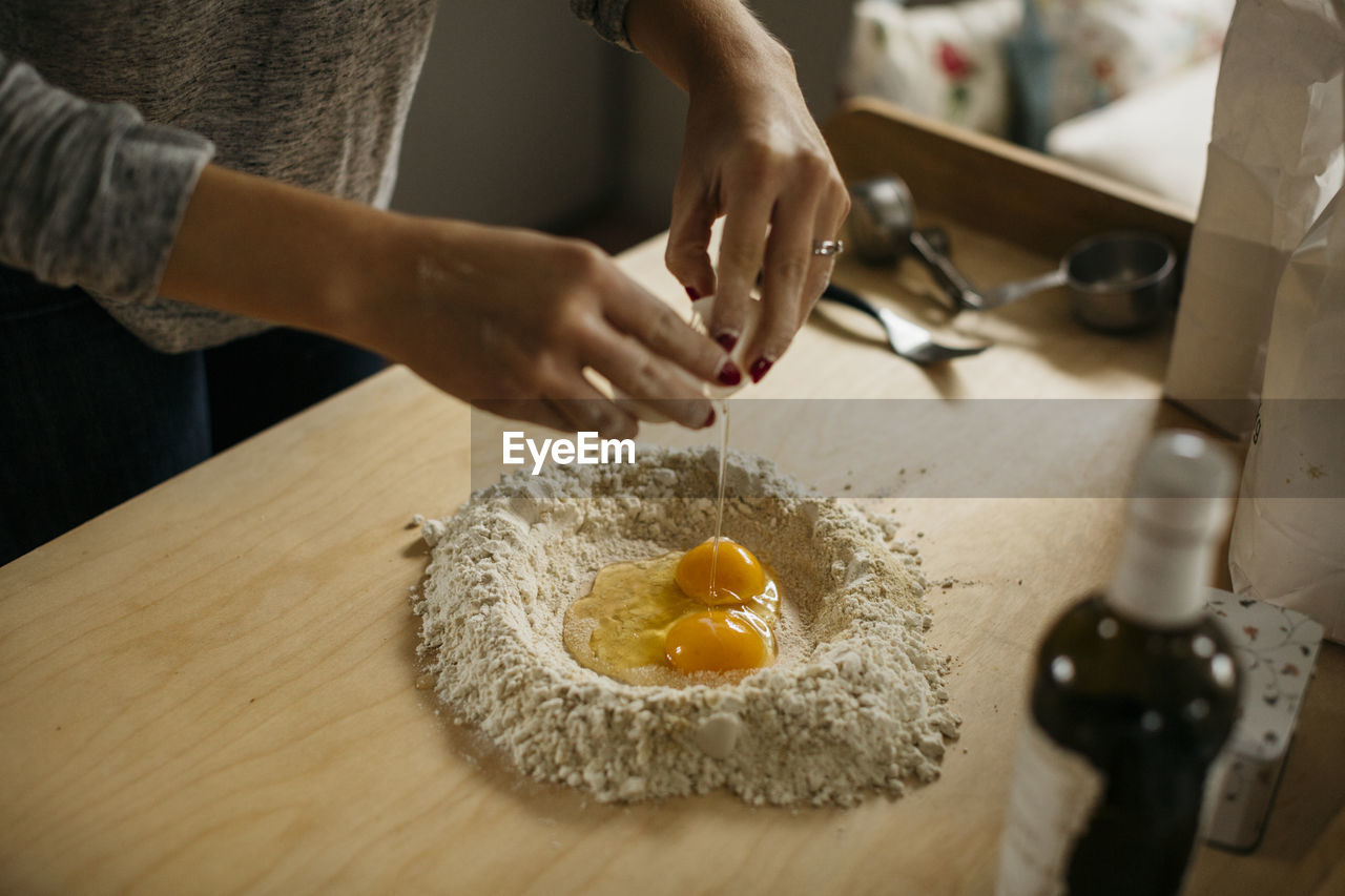 Woman preparing dough