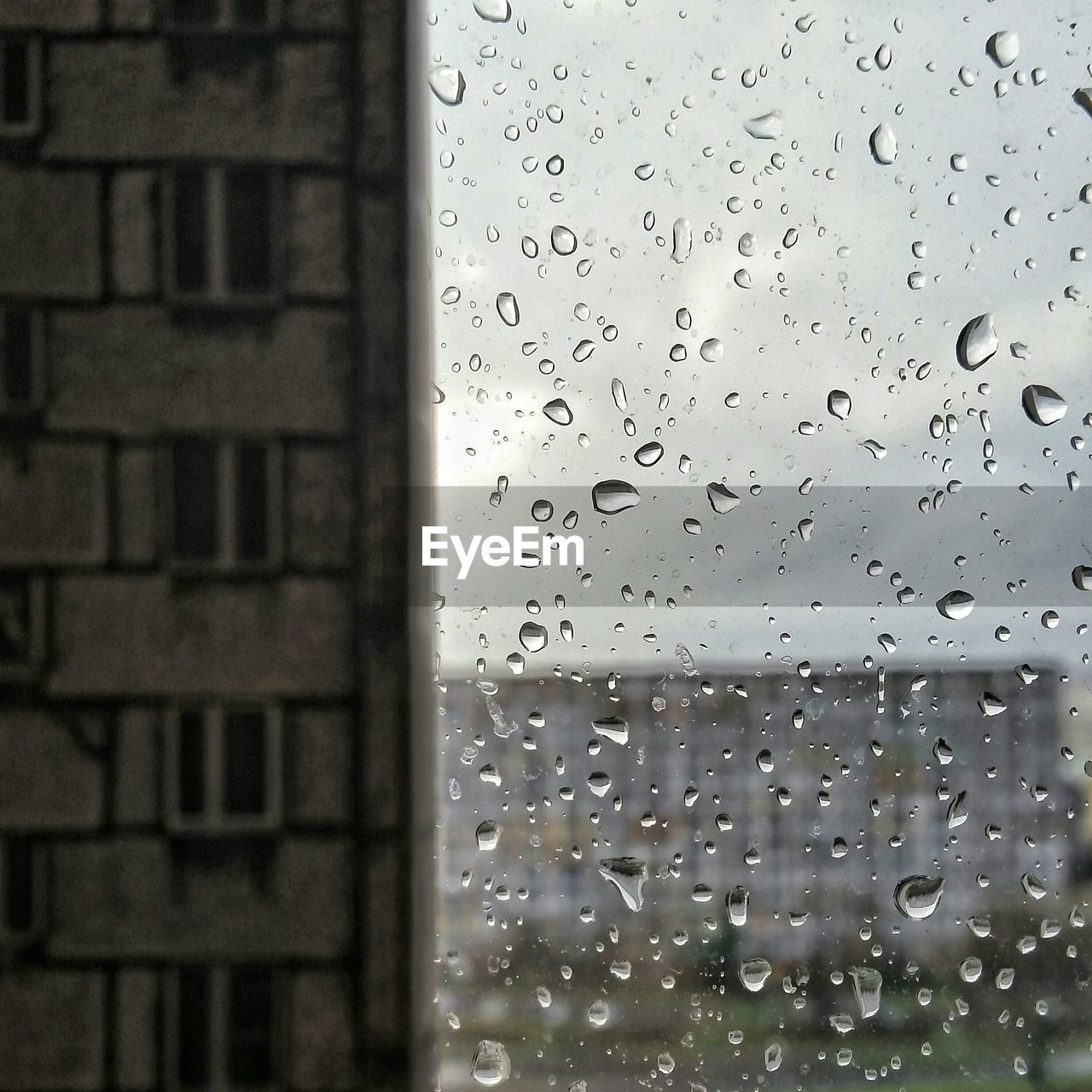 Water drops on glass window during monsoon