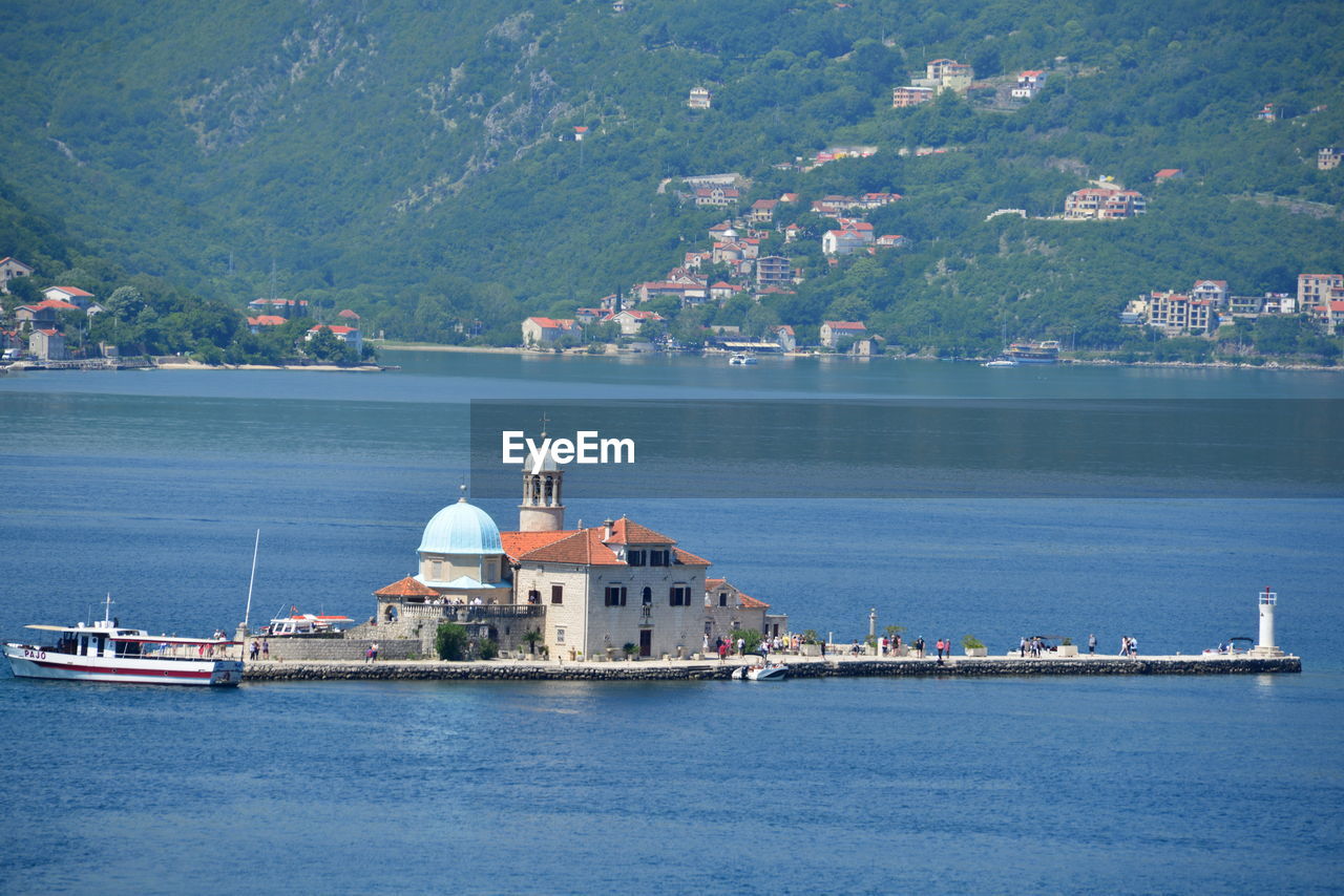 Kotor bay are a series of coves on the southern dalmatian coast of the adriatic sea in montenegro