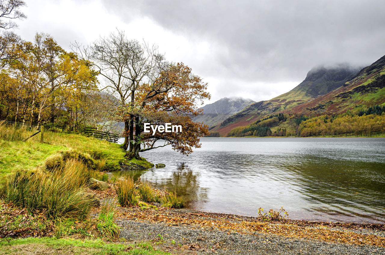 Scenic view of lake against sky during autumn