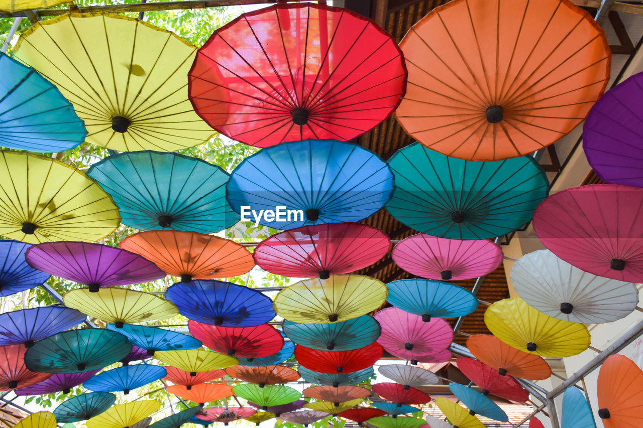 FULL FRAME SHOT OF COLORFUL UMBRELLAS FOR SALE