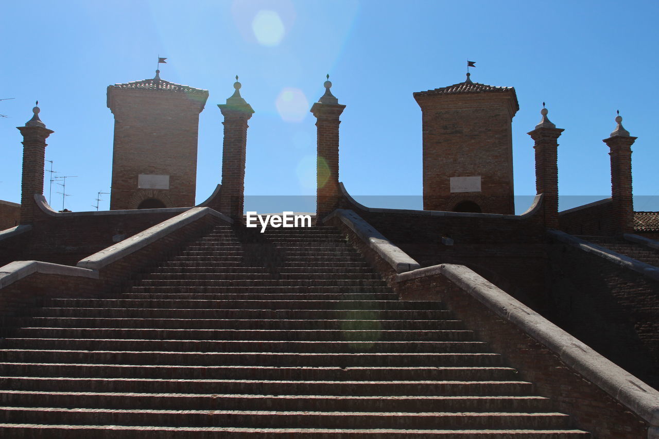 LOW ANGLE VIEW OF STEPS LEADING TOWARDS BUILDING