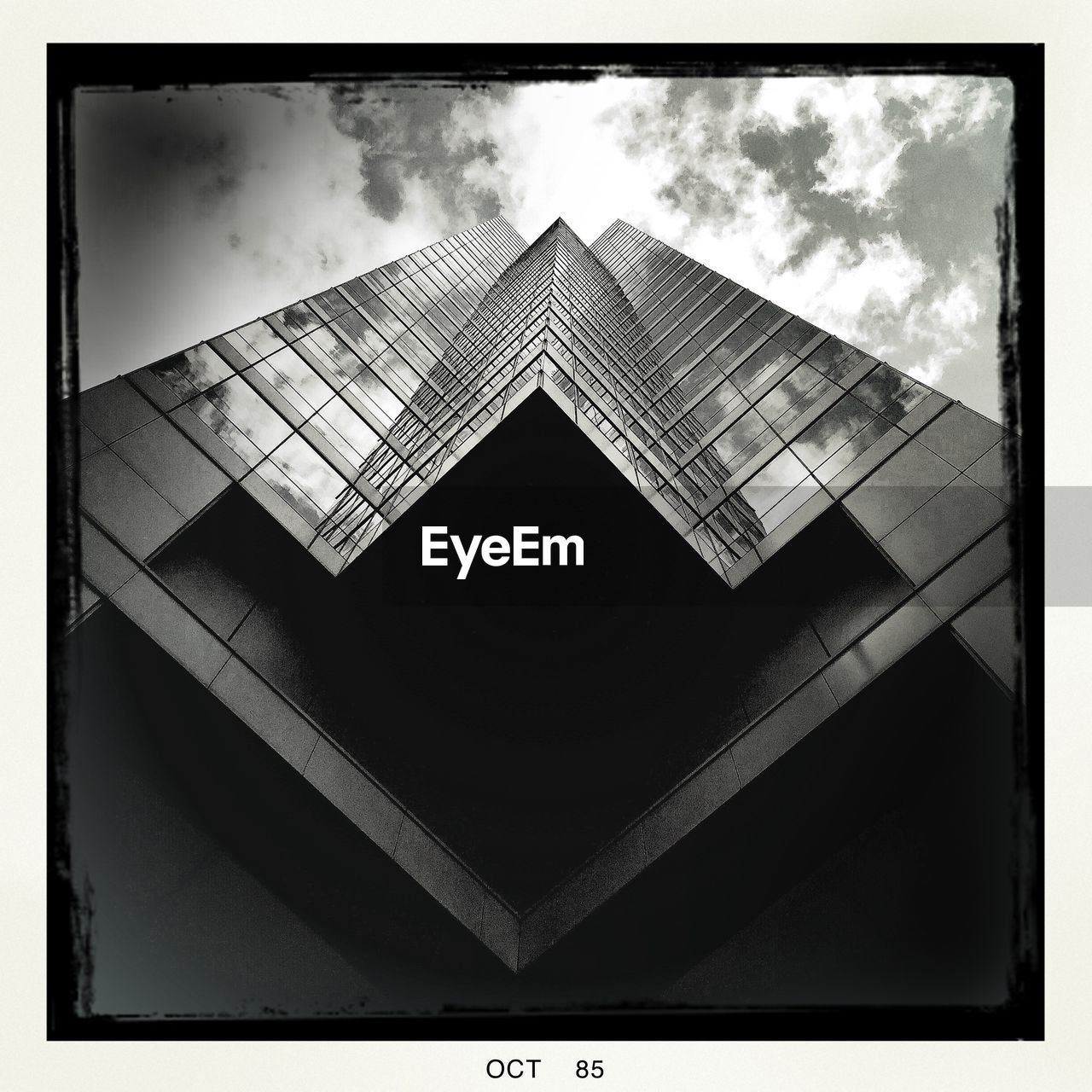 LOW ANGLE VIEW OF BUILDINGS AGAINST SKY