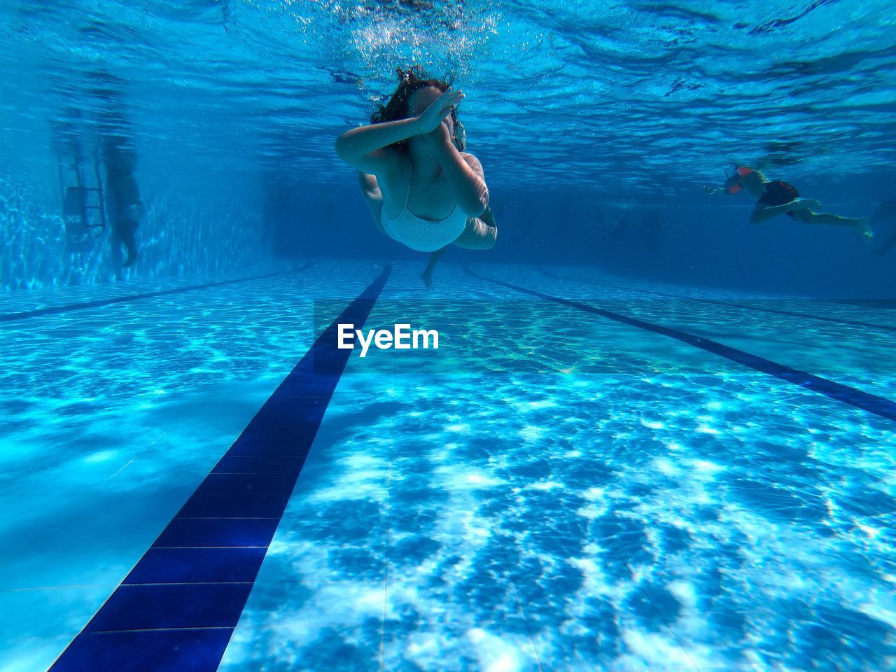 Girl swimming in pool