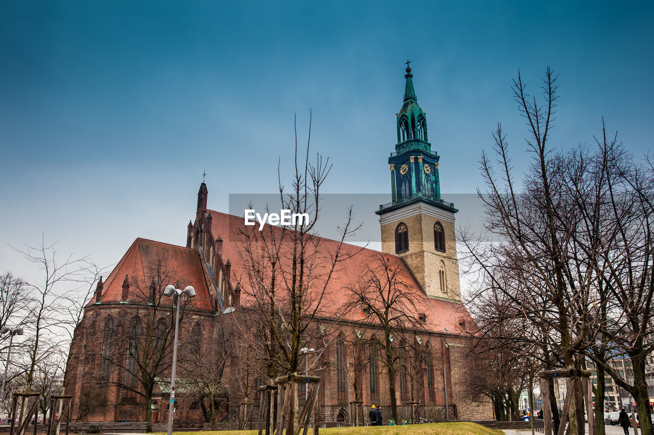 The historical and beautiful st. mary's church located in central berlin on a cold end of winter day