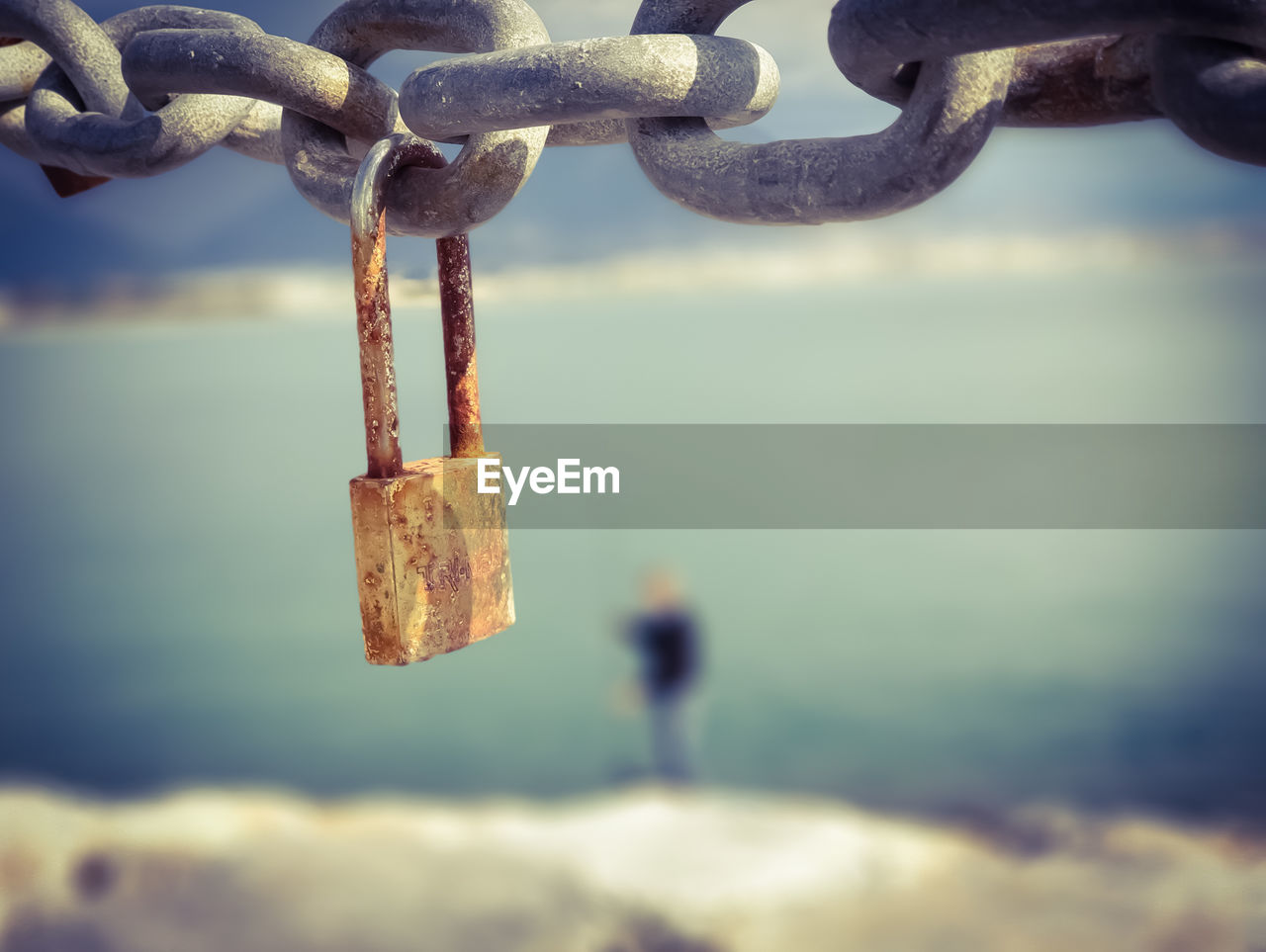 Close-up of padlock on chain