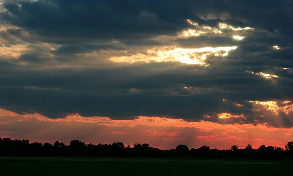 SCENIC VIEW OF LANDSCAPE AGAINST DRAMATIC SKY