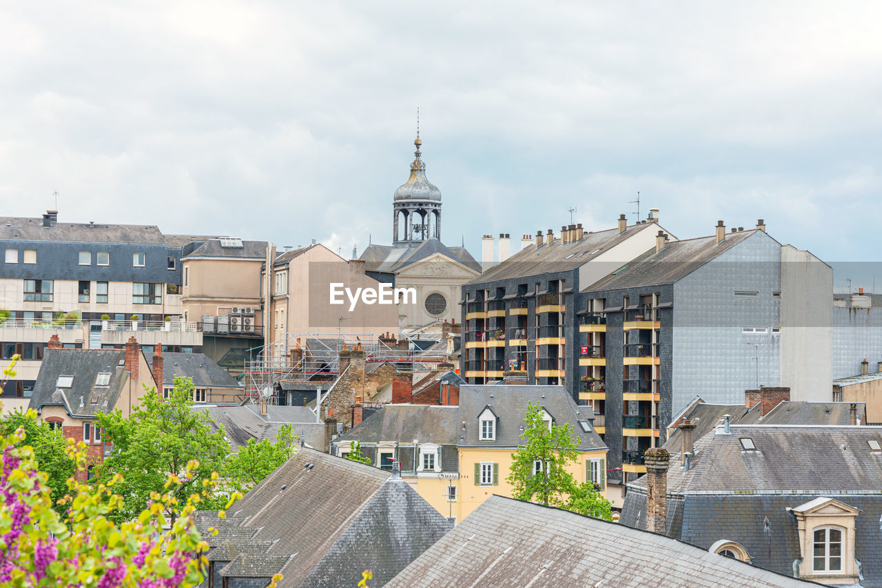 VIEW OF BUILDINGS IN TOWN AGAINST SKY