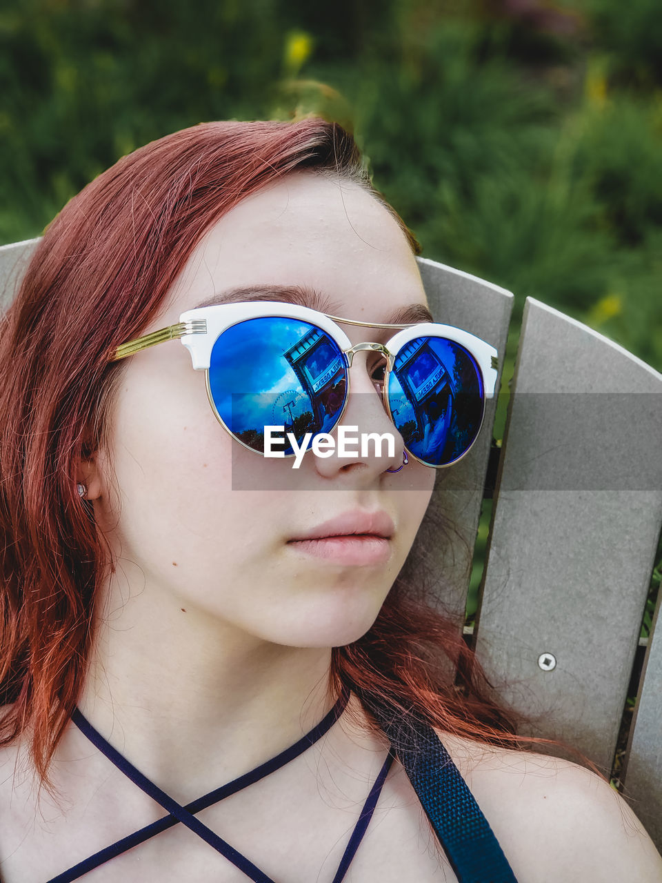 Close-up of woman relaxing outdoors