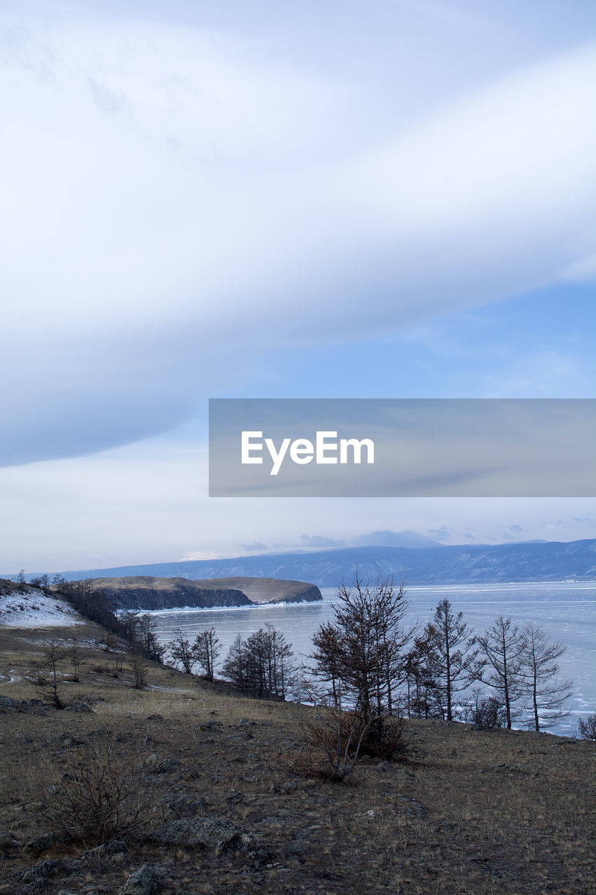Scenic view of sea against sky during winter