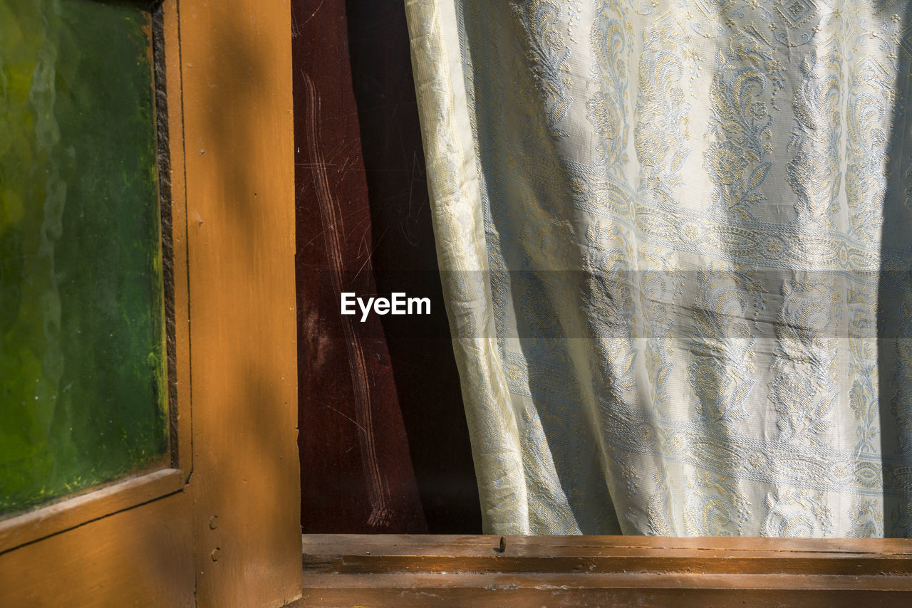 Close-up of curtain against window