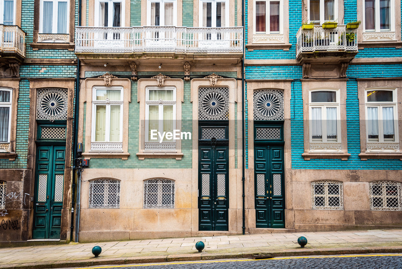 View of green doors of building