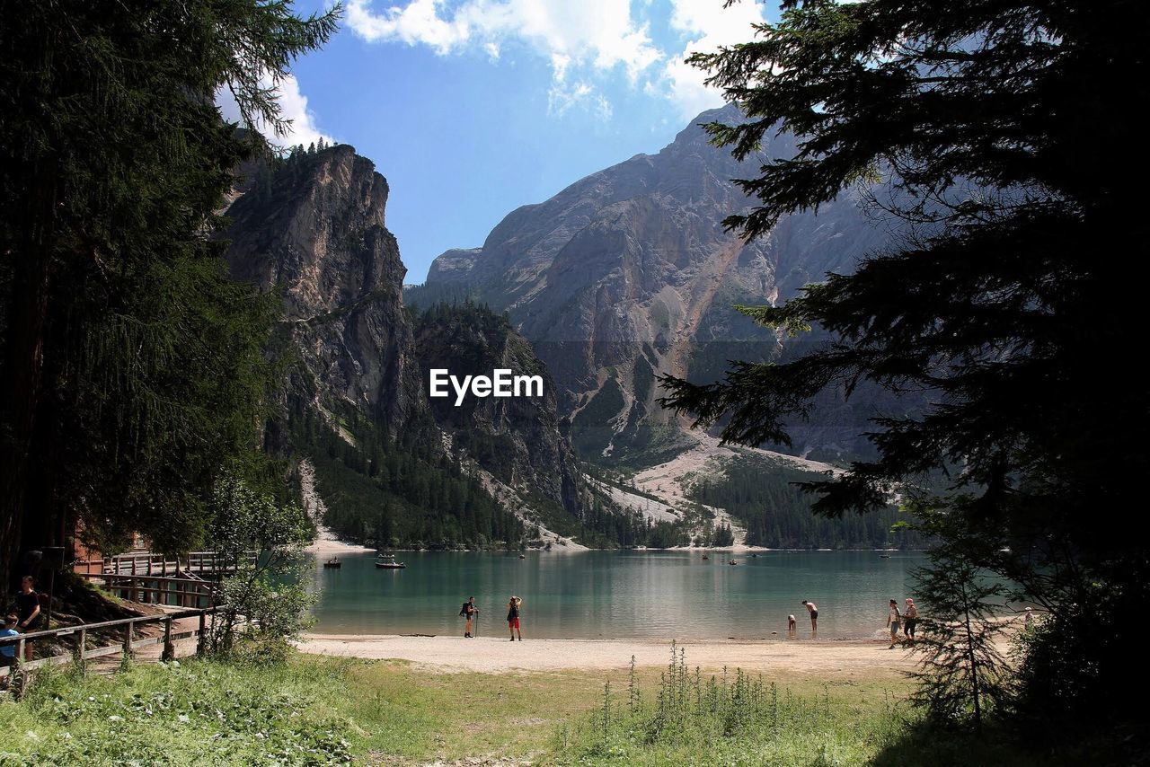 SCENIC VIEW OF LAKE AND MOUNTAINS