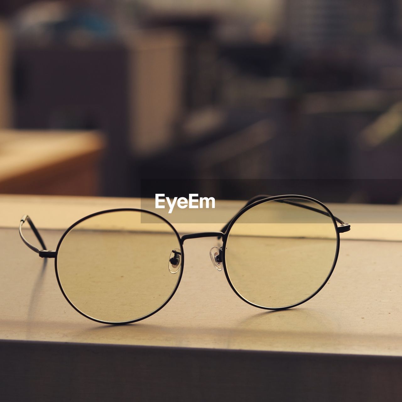 Close-up of eyeglasses on table