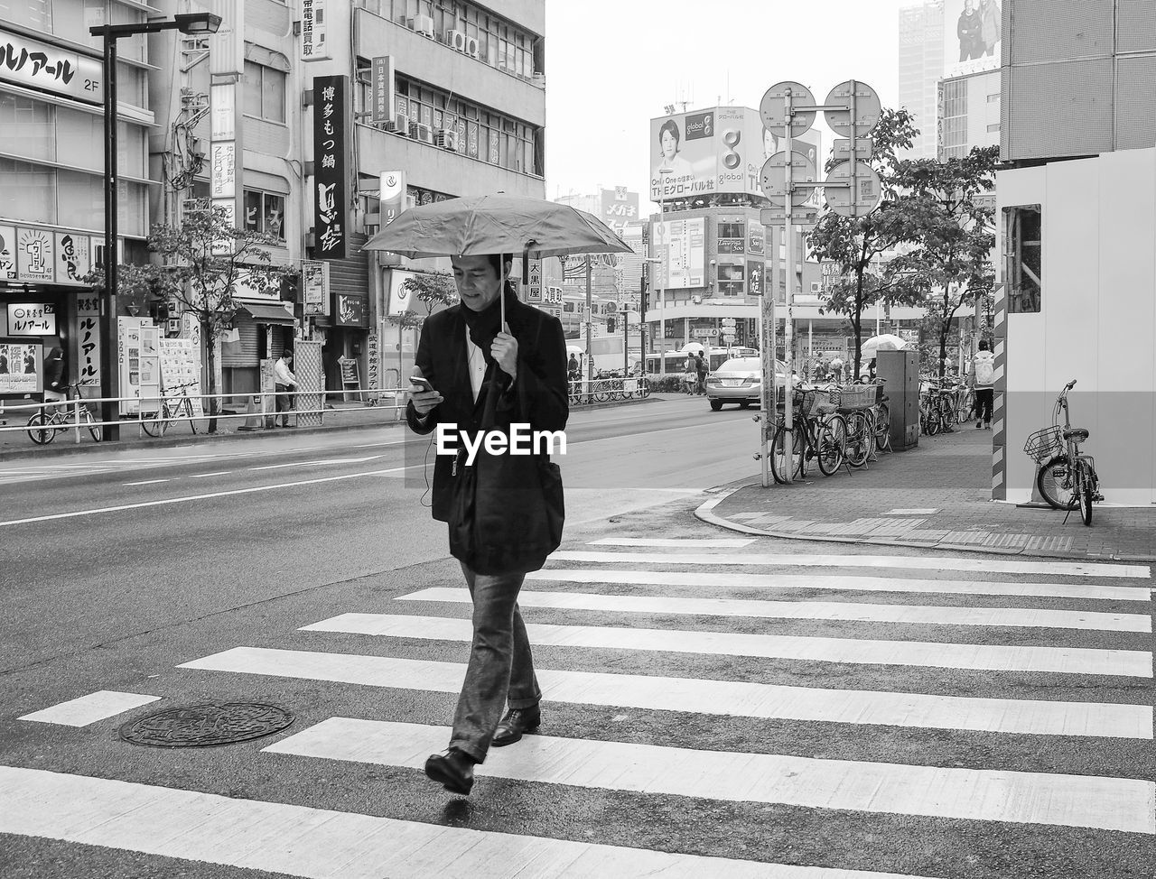 WOMAN WALKING ON STREET