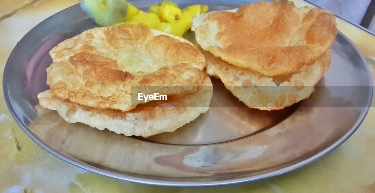 CLOSE-UP OF SERVED FOOD