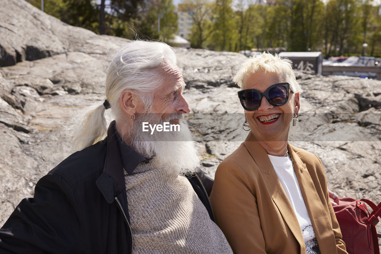 Smiling couple sitting together