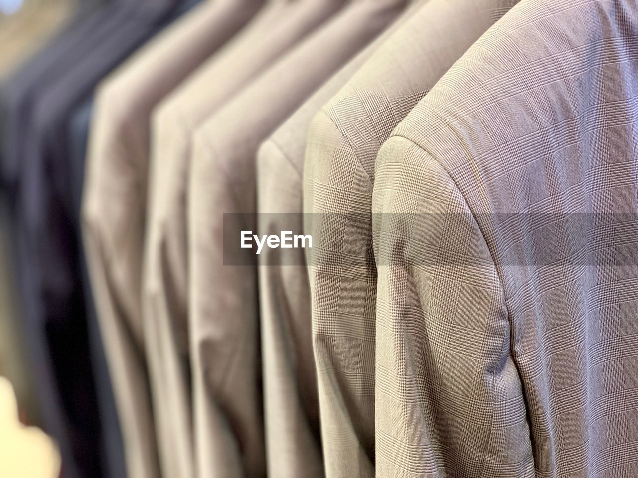 FULL FRAME SHOT OF CLOTHES HANGING ON STORE