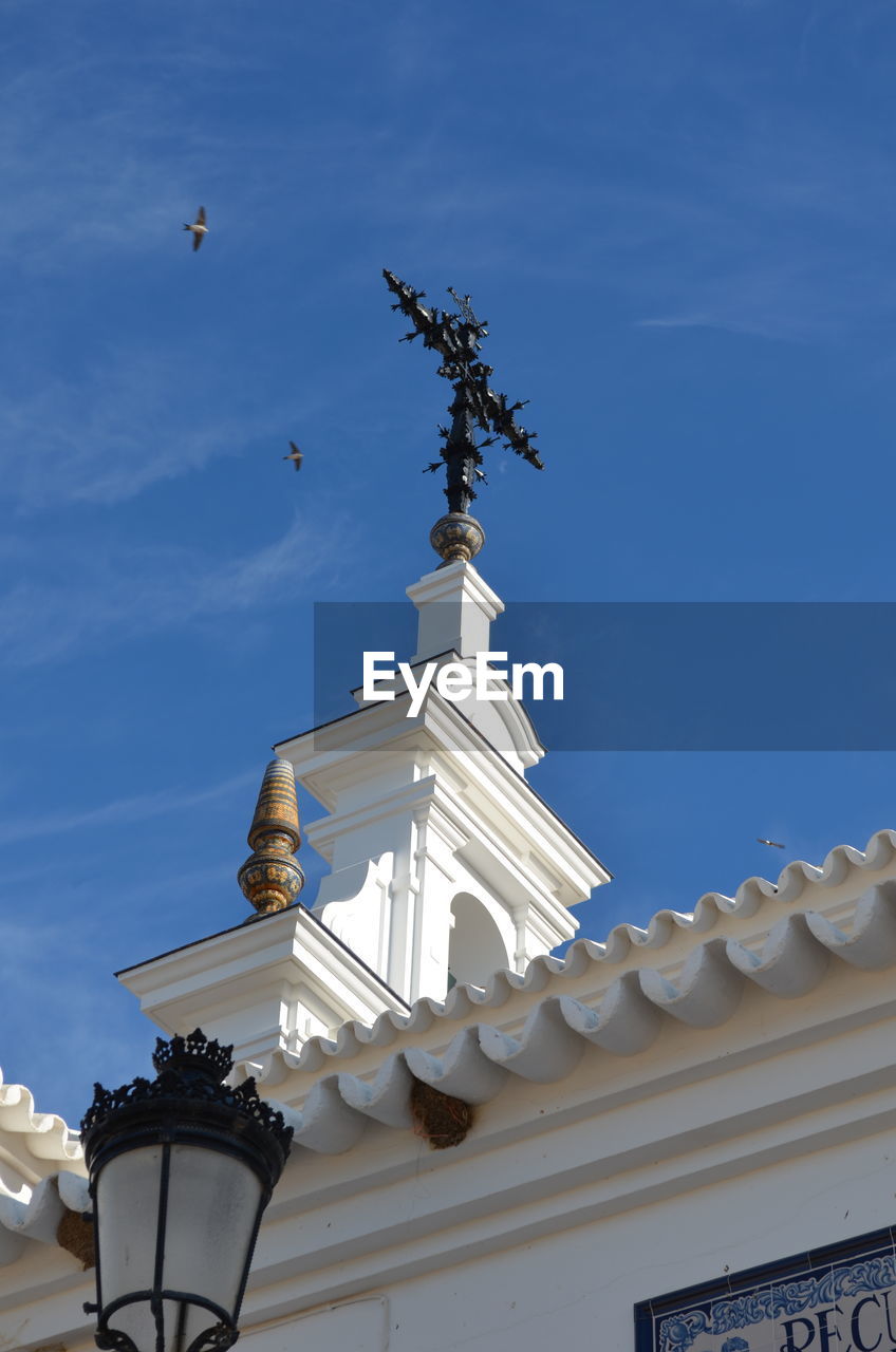 High section of church against blue sky