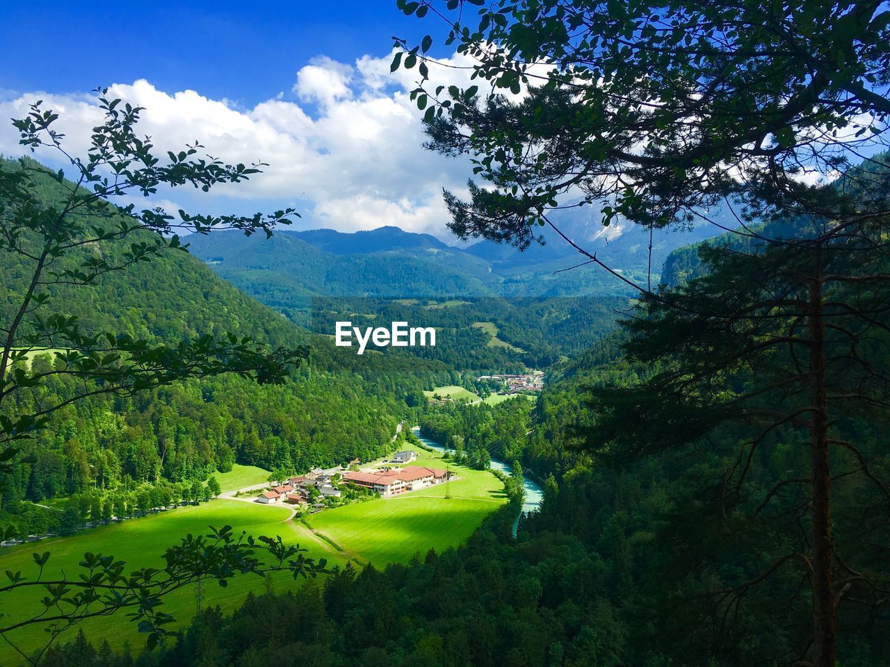 Scenic view of landscape and mountains against sky