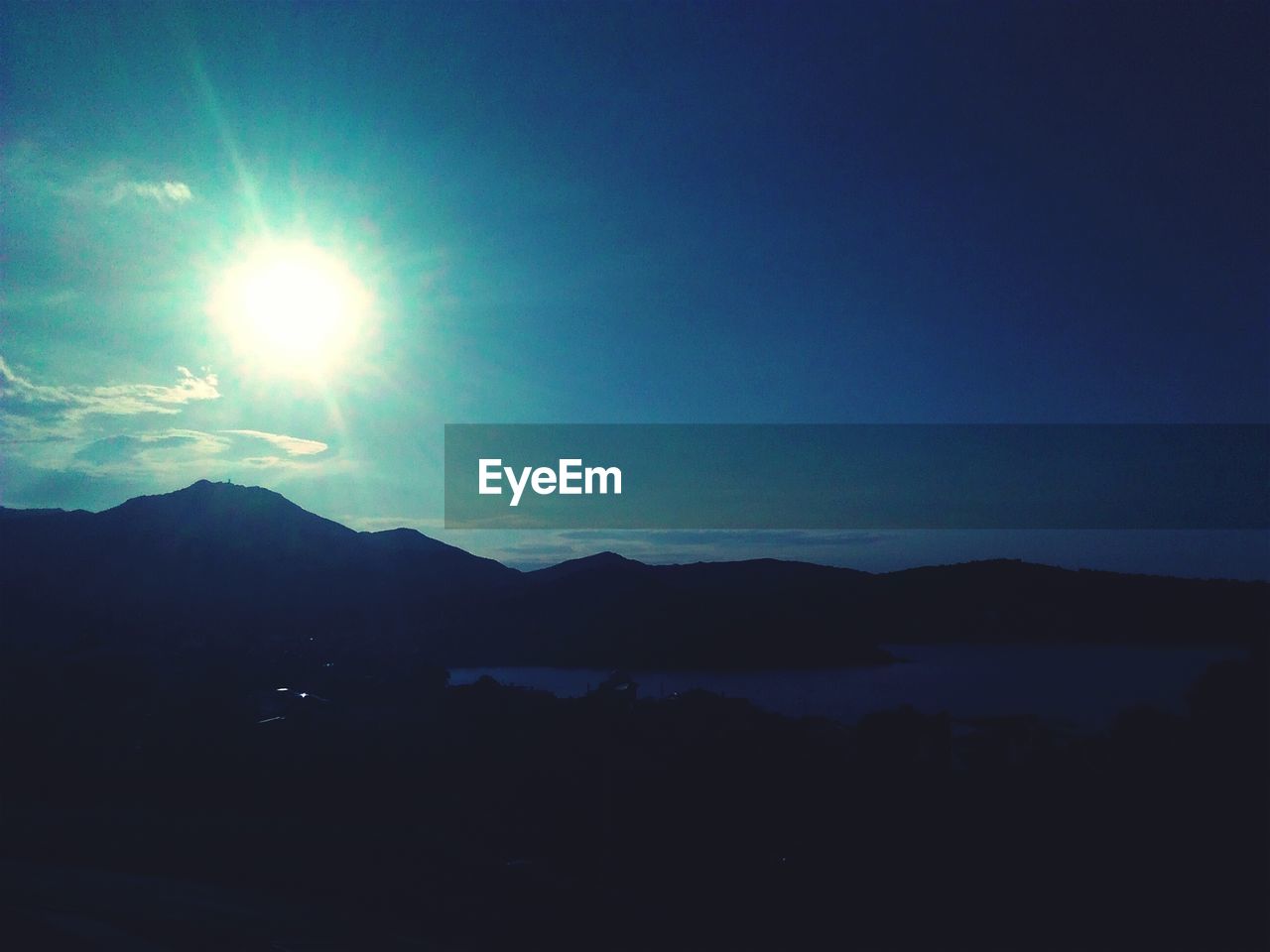 Silhouette of landscape against sky