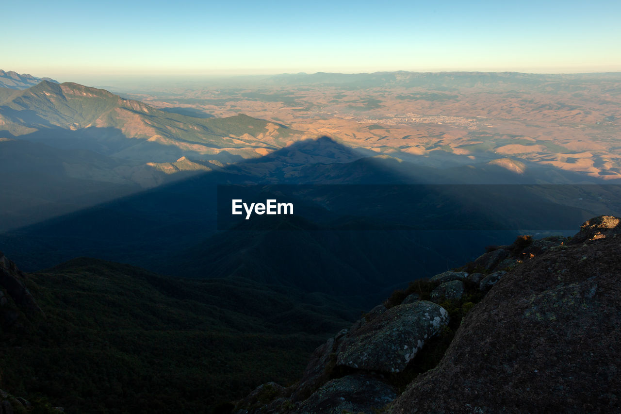 AERIAL VIEW OF SNOWCAPPED MOUNTAINS