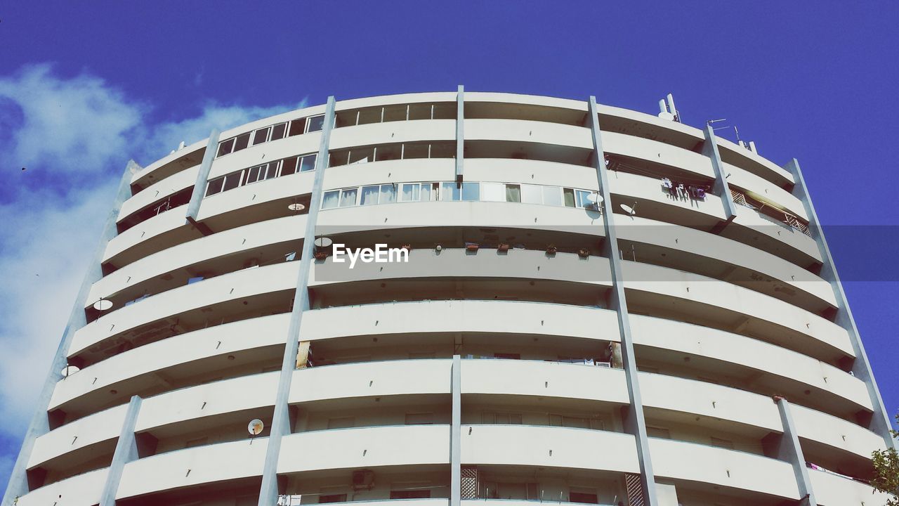 Low angle view of modern building against sky