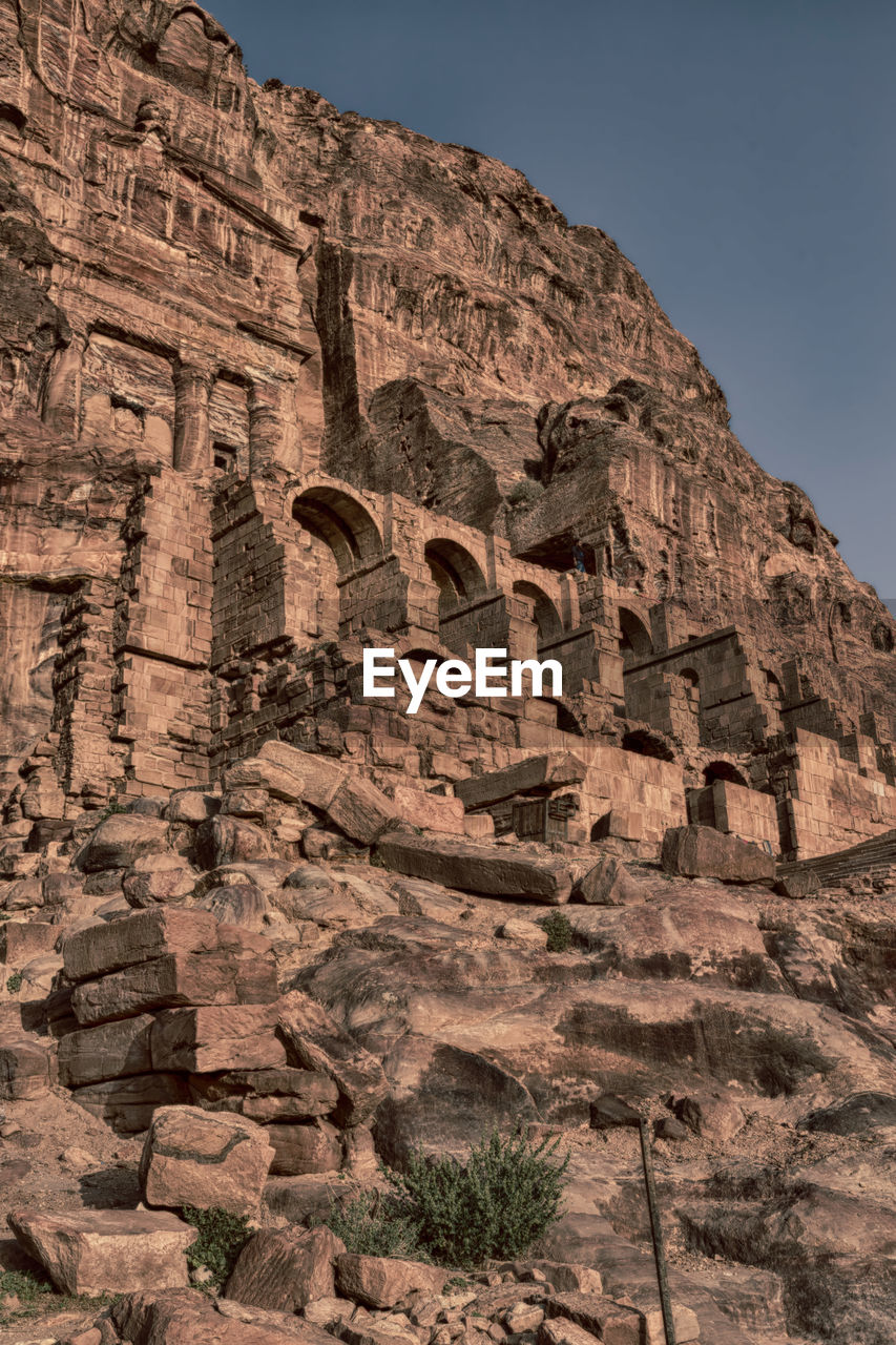 LOW ANGLE VIEW OF ROCK FORMATION