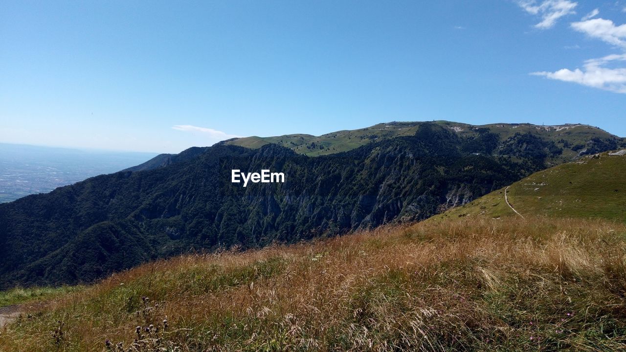 SCENIC VIEW OF MOUNTAIN AGAINST SKY