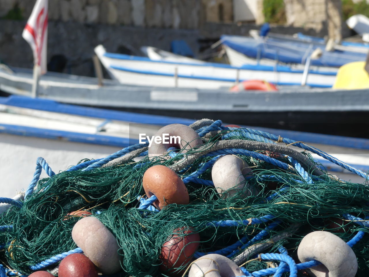 High angle view of fishing net at harbor