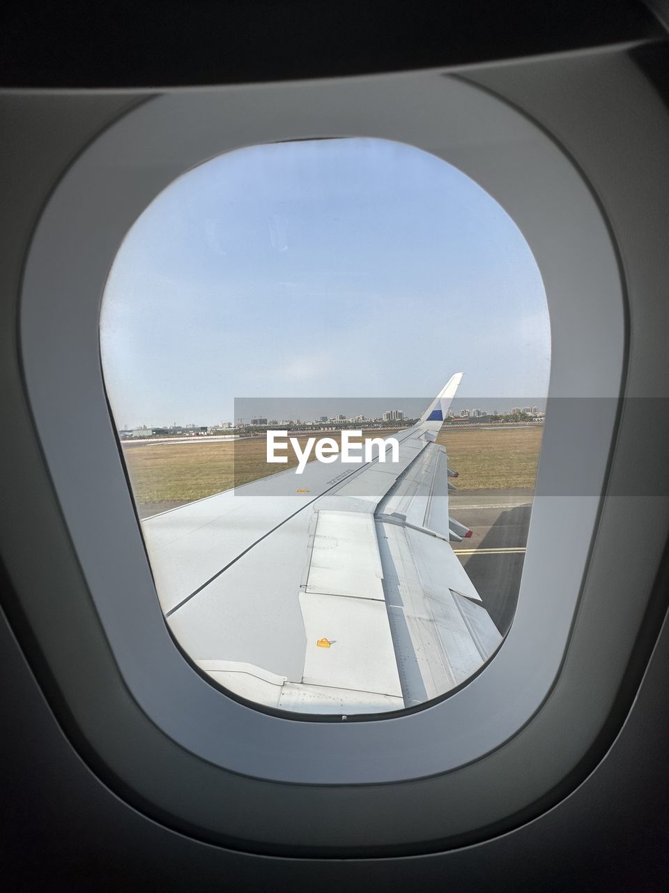 airplane, air vehicle, transportation, mode of transportation, window, travel, flying, aircraft wing, sky, vehicle interior, journey, vehicle, no people, glass, nature, aerospace industry, airport, aerial view, day, looking, outdoors, automotive exterior, wheel, car, cloud