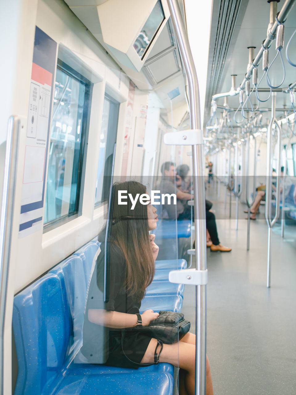 City life concept from asian woman use public skytrain.