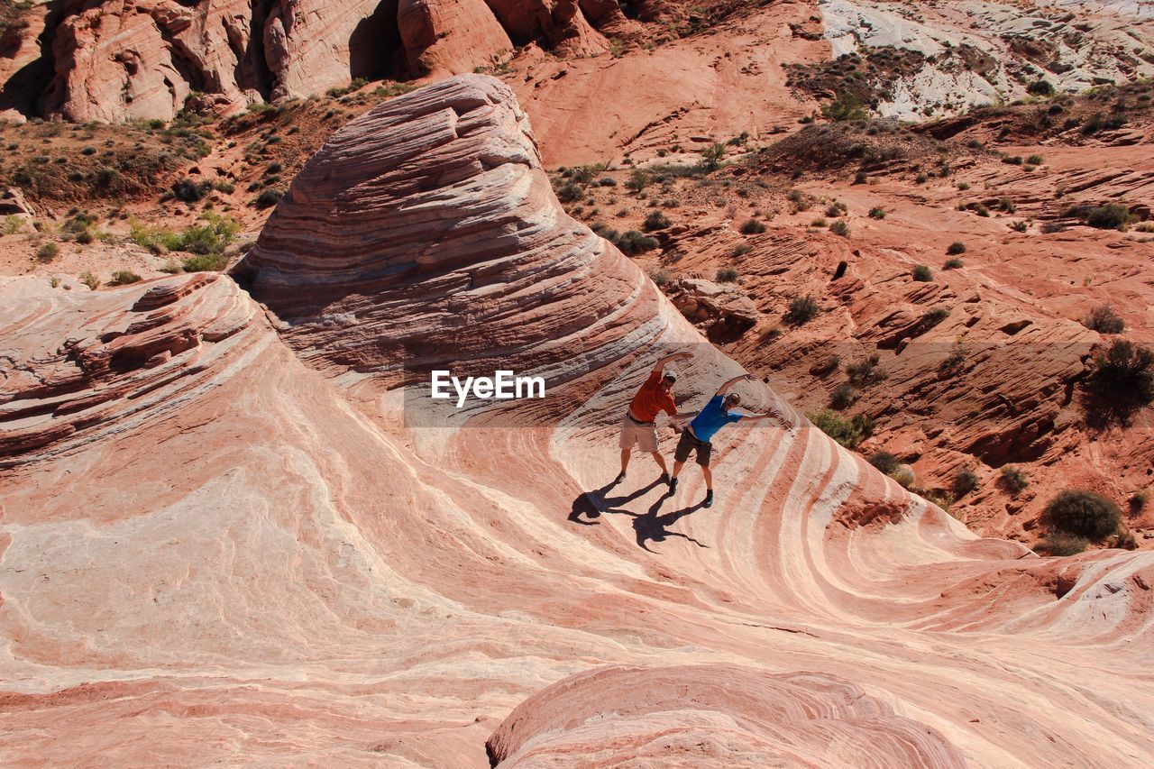 Tourists on rock formation