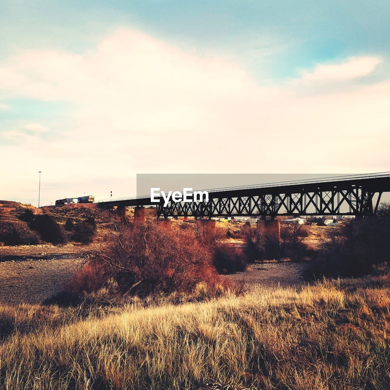 VIEW OF RAILROAD TRACKS AGAINST SKY