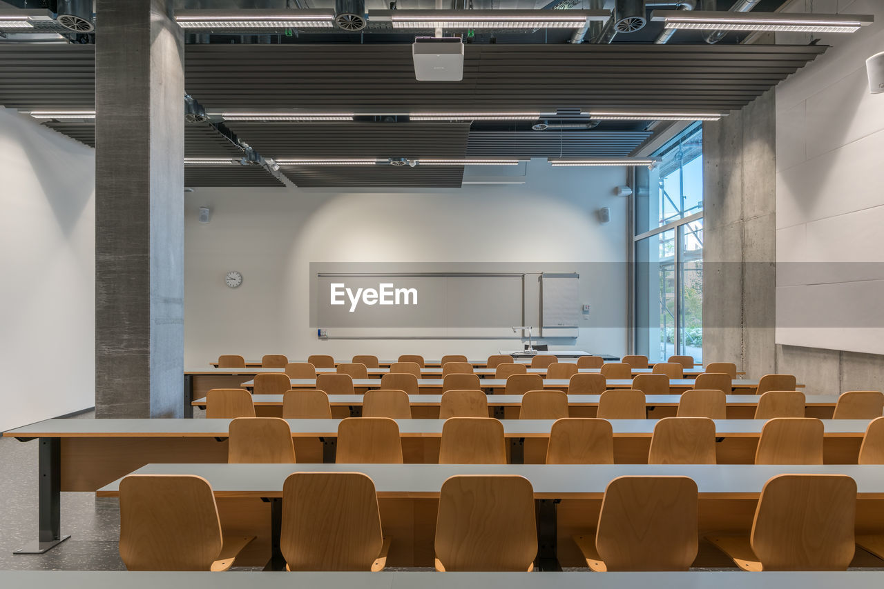 Empty chairs in classroom