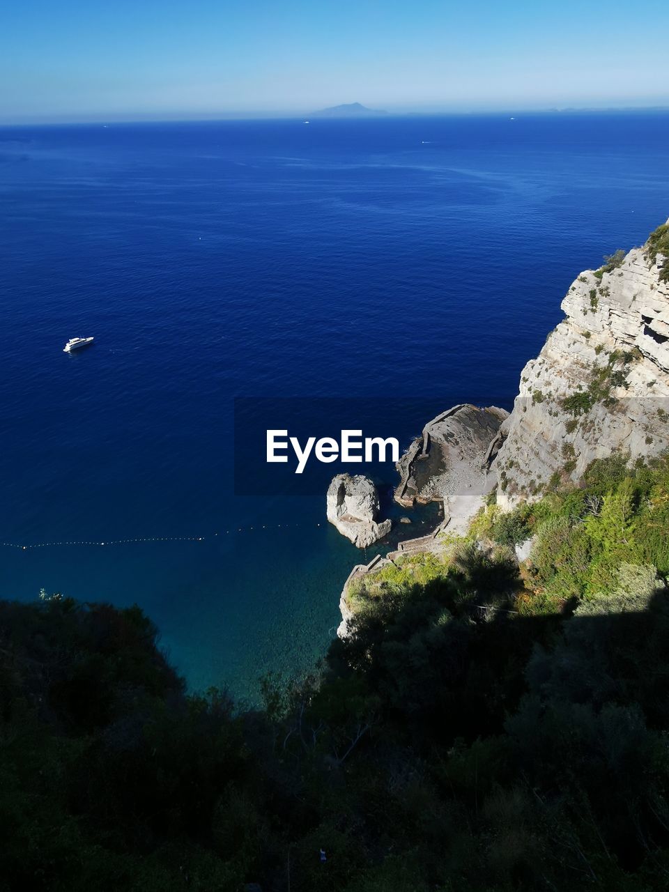 SCENIC VIEW OF SEA AND ROCKS