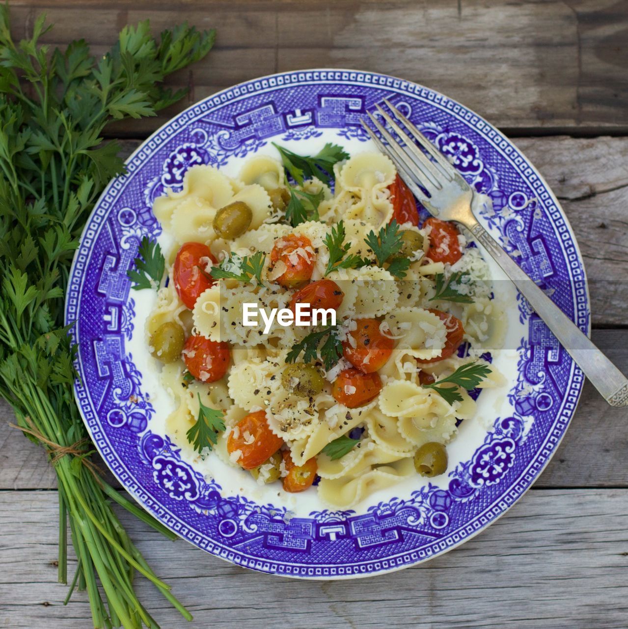 High angle view of pasta served in plate on table