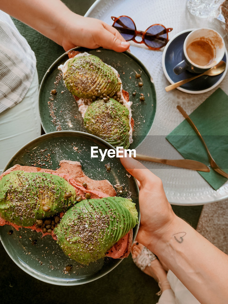 High angle view of women holding food