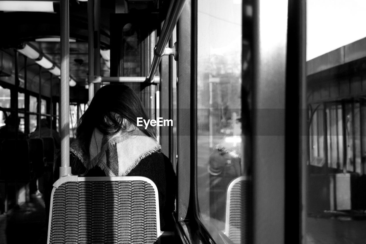 Woman on public transportation