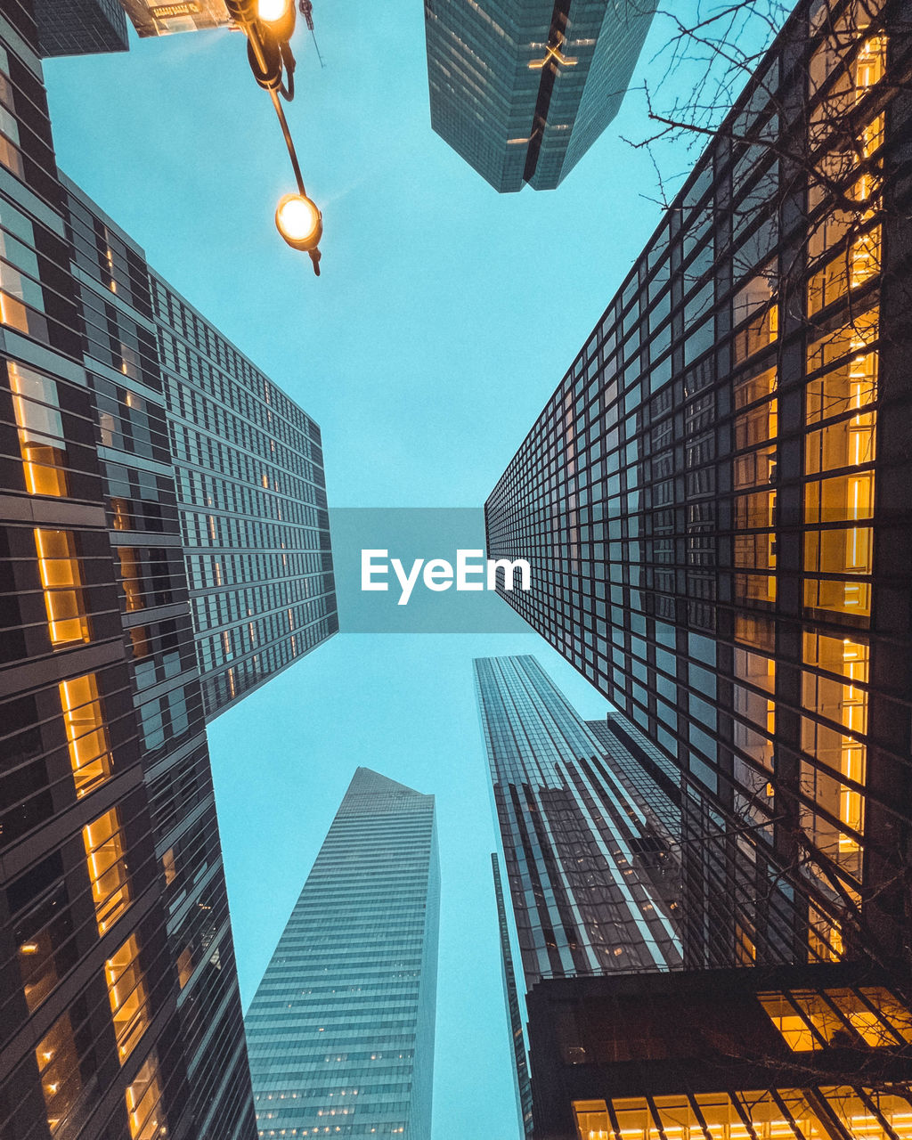 low angle view of skyscrapers against sky